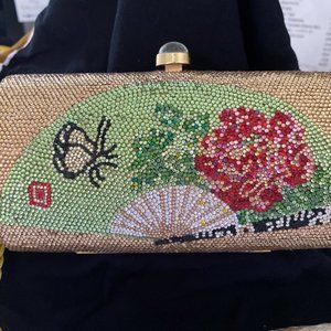 Fancy hand designed with Swarovski crystal's clutch purse.